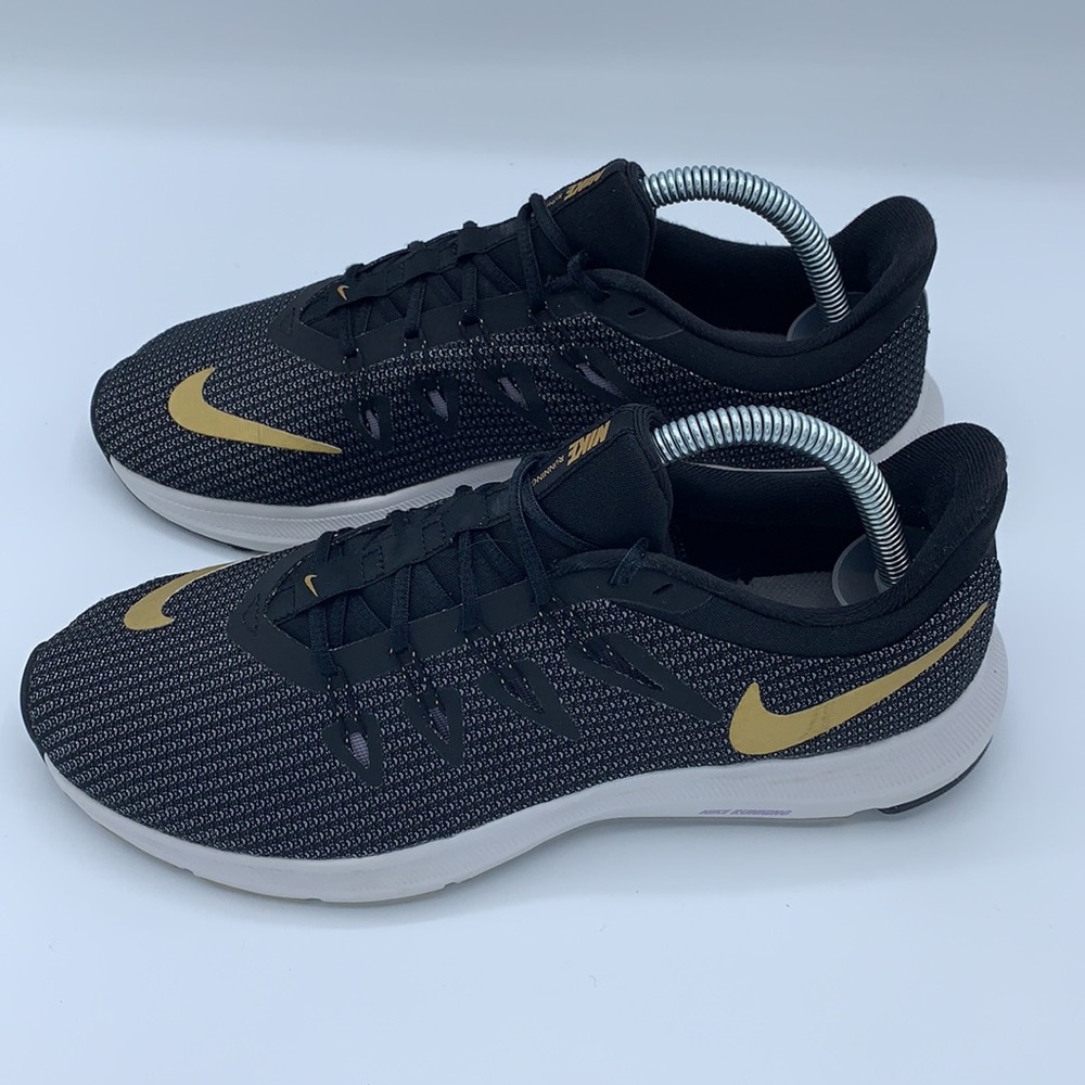 nike gold and black shorts